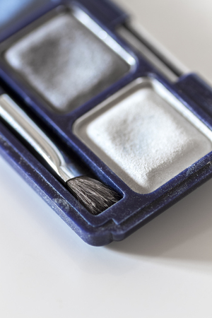 A set of female shadows in a blue box close-up.の写真素材