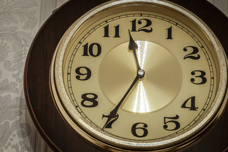 Wall pendulum clock with the fight in the old style.