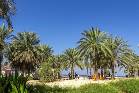 Dubai, UAE - November 30, 2018: Rest on the city beach. Al Mamzar Beach Park.のeditorial素材