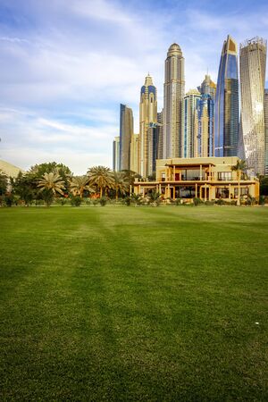 Dubai, UAE - December 2, 2018: High-rise houses of modern futuristic design of Dubai Marina district.のeditorial素材