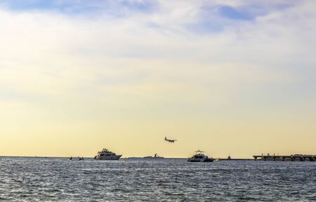 Beautiful city beach in the bay with clear water.の写真素材