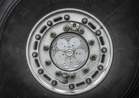 Wheel closeup of a heavy off-road racing truck.