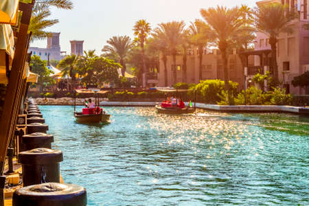 Dubai, UAE - November 29, 2018: Area Hotel Jumeirah Al Qasr. Built in the style of the summer residence of the sheikh. Located on a private beach, in a spacious area with landscaped gardens and artificial canals.のeditorial素材