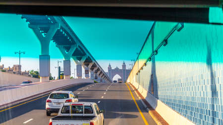 Dubai, UAE - November 29, 2018: Urban roads through the front window of the car. The Shoreline Street.のeditorial素材