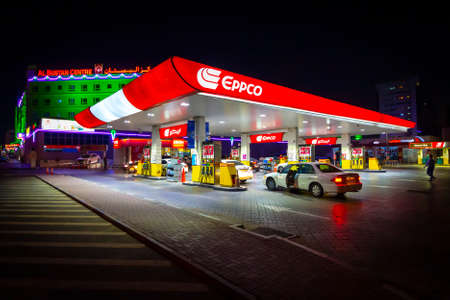 Dubai, UAE - November 28, 2018: Dubai's Eppco city gas station at night.のeditorial素材