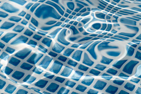 Part of a blue inflatable pool in the backyard of a private house.の写真素材