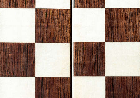A fragment of a handmade lacquered chessboard.