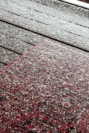 The first snow fell on the veranda of a private house.の写真素材