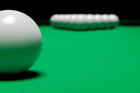 Billiard balls in the initial position on the green field of the billiard table.