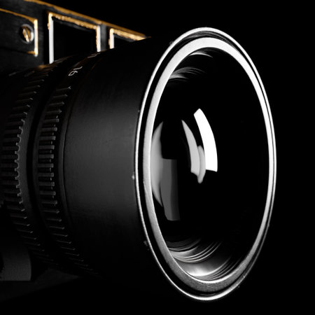 Old camera close-up in a dark room.の写真素材