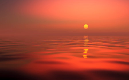 Beautiful sunset over the calm surface of the ocean.の写真素材