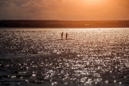 Beautiful autumn sunset over the cold sea.の写真素材