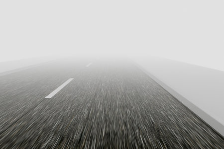 Driving a car on an asphalt road during fog.の写真素材