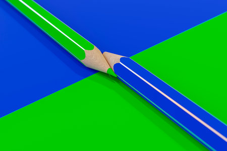 Two colored wooden pencils on a colored background.の写真素材