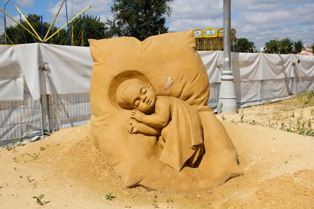 KOLOMENSKOYE,MOSCOW,RUSSIA-AUGUST 2, 2013:âMystery of the worldâ.  Sand sculpture Festival. Angel. Author (Russia) Bagrat Stepanyan.のeditorial素材