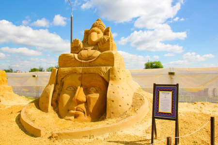 KOLOMENSKOYE, MOSCOW, RUSSIA-AUGUST 2, 2013:âMystery of the worldâ.  Sand sculpture Festival. "A symbol of peace". Author (India) Sudarsan Pattnaik.のeditorial素材