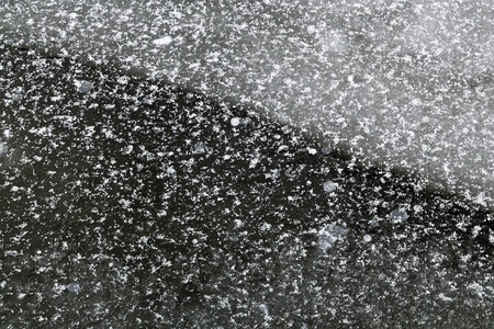 Thin ice with snowflakes  Natural horizontal backgroundの写真素材