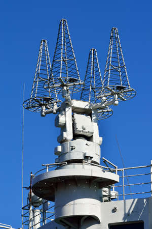 Complex marine antennas close up against the blue skyの写真素材