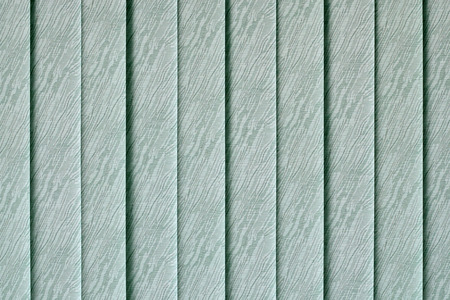 Vertical blinds on the window of the officeの写真素材