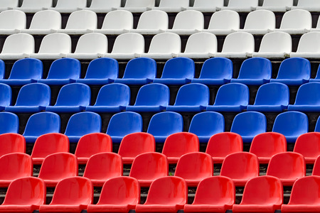 Empty grandstand with Seating in the colors of the Russian flag