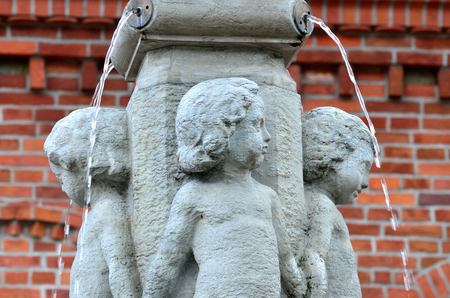 Fountain Putti. German sculptor Stanislaus Kauer, Made in1908. Kaliningrad, formerly Koenigsbergの写真素材