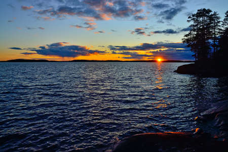 Romantic sunset on lake Keret, Northern Karelia, Russiaの写真素材