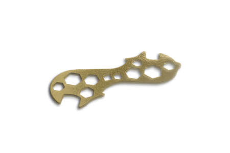 Gold spanner, isolated on white backgroundの写真素材