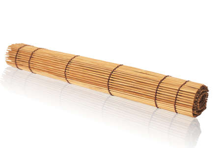 rolled bamboo mat on a white background                の写真素材