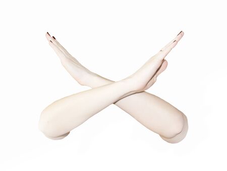 crossed woman's hands , X sign with arms の写真素材