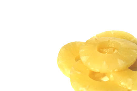 yellow canned pineapple rings, vegetarian food  の写真素材