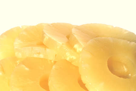 yellow canned pineapple rings, vegetarian food  の写真素材
