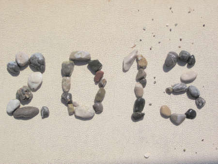 Letteres 2013 made of small pebble stones on ribber texture の写真素材