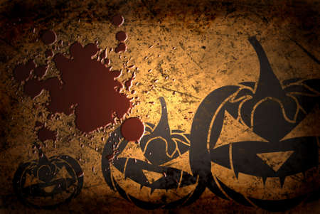 Scary Jack O Lantern halloween pumpkin on  grunge background with bloodの写真素材