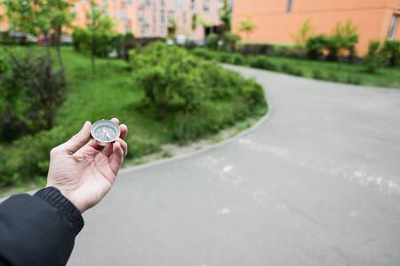 Compass in handの写真素材