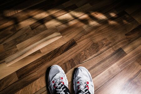 Sneakers on wooden background