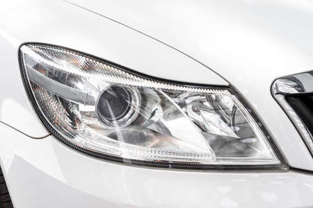 Modern car headlight, car exterior detail