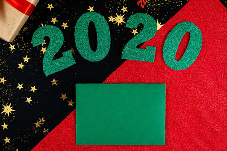 Christmas background with green numbers and greeting cardの写真素材
