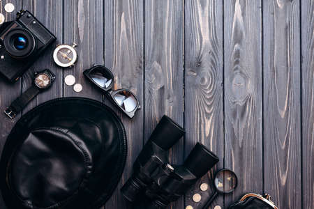 On a wooden table are things for travel. The concept of preparation for travel. High quality photoの写真素材