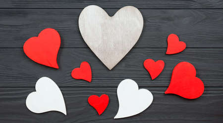 Wooden hearts on a wooden backgroundの写真素材