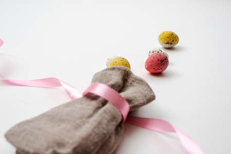 Closeup bag with eggs on the table. Easter backgroundの写真素材
