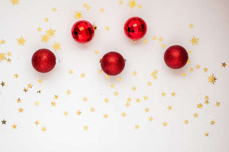 On Light Christmas background are red ballsの写真素材
