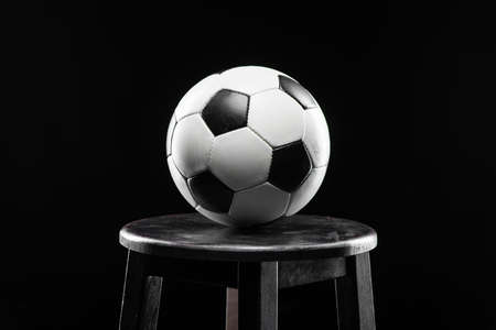 Classic soccer ball on black backgroundの写真素材