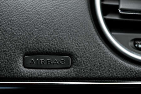 Close up image of the airbag  on the steering wheel of a car.- Imageの写真素材