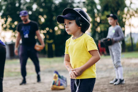 Kyiv, Ukraine - June 3, 2020: Close up view, little baseball player staring intentlyのeditorial素材