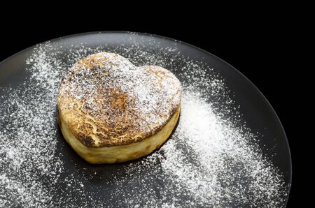 Cottage cheese casserole with heart shaped sugarの写真素材