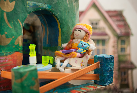 Doll on the balconyの写真素材