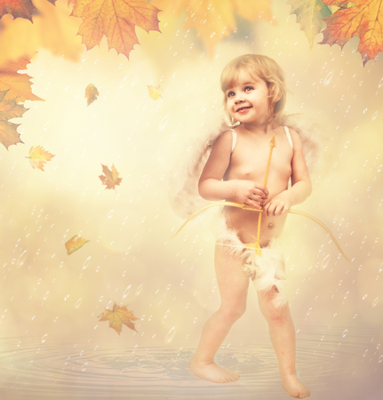 a small child in the rainの写真素材