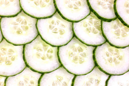 Sliced Cucumber laid out in a decrotive patternの写真素材
