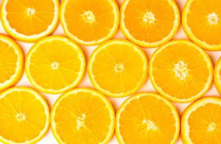 Sliced Orange Layed out in a decrotive pattern