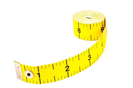 Bright Yellow Rolled Up Tape Measure on White background